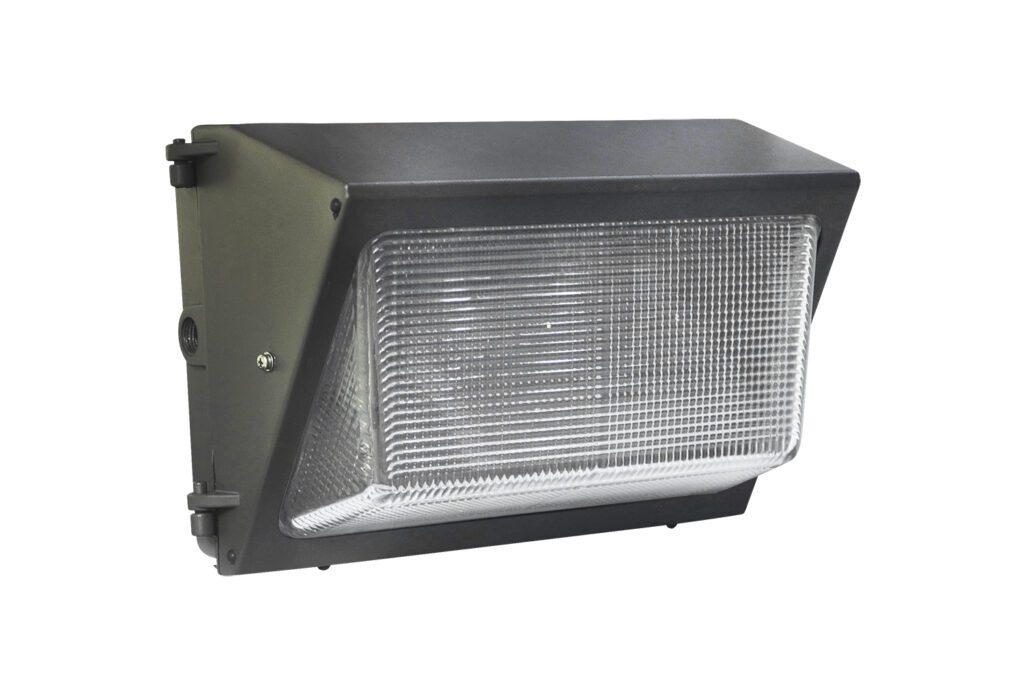 Outdoor wall light fixture with prismatic lens